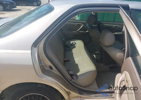 1999 Toyota Camry Le z USA, uszkodzony, nr VIN 4T1BG22K1XU406852